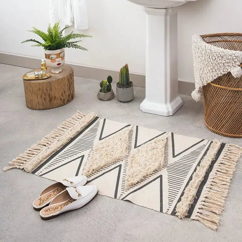 Cotton bedside blanket in front of hand-washing table - alvin